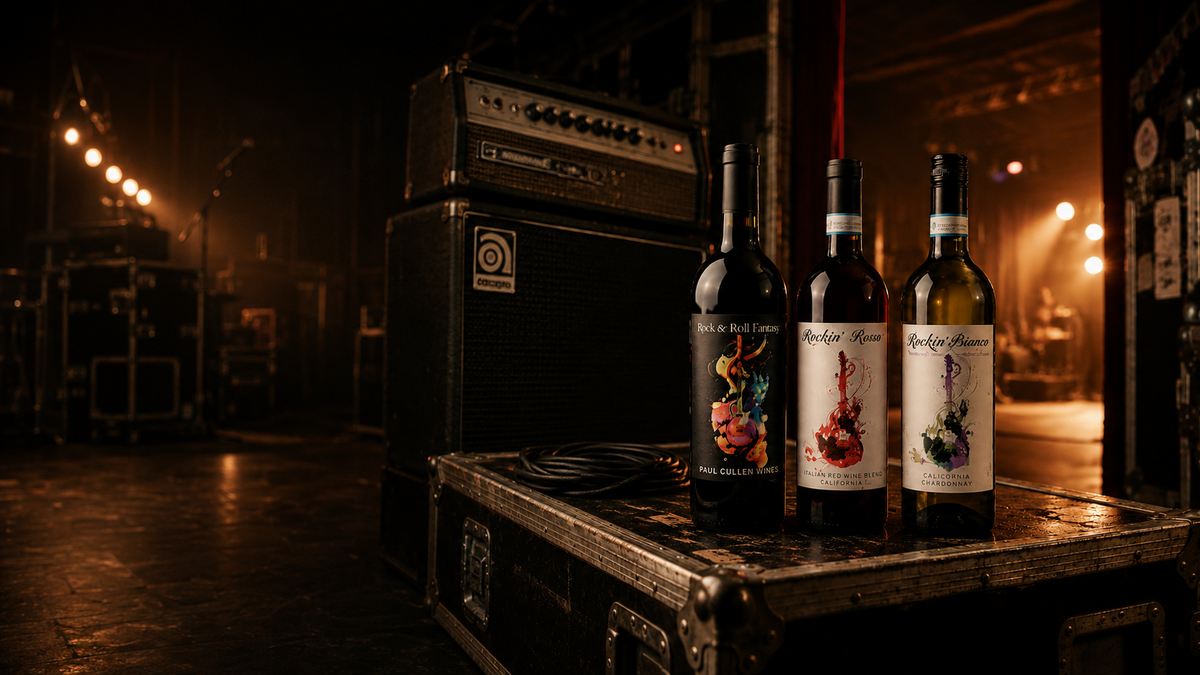 Three Paul Cullen wine bottles on a vintage backstage road case