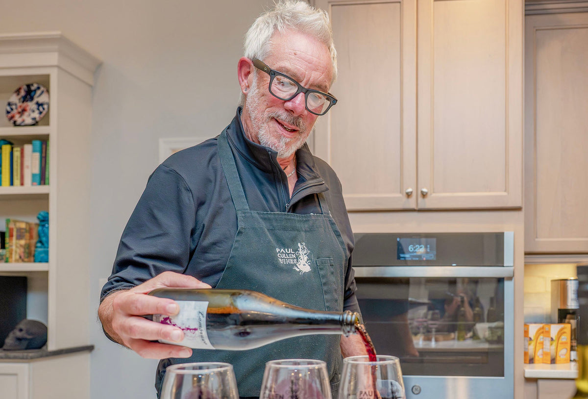 Paul Cullen pouring a flight of red wine